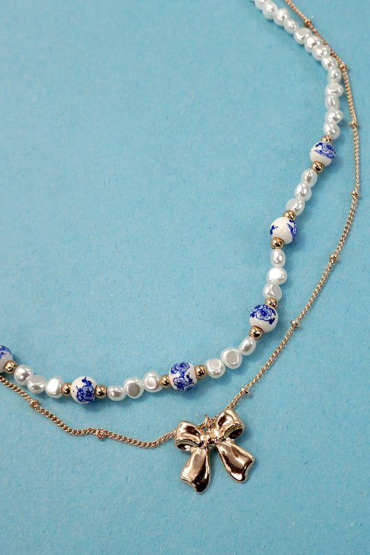 CERAMIC PORCELAIN PEARL BOW LAYER NECKLACE