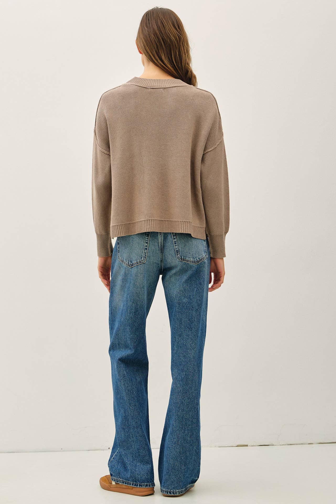RIBBED KNIT SWEATER WITH RAW SEAM DETAILS