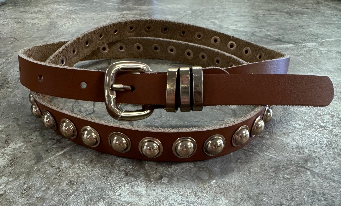 Gold studded brown belt