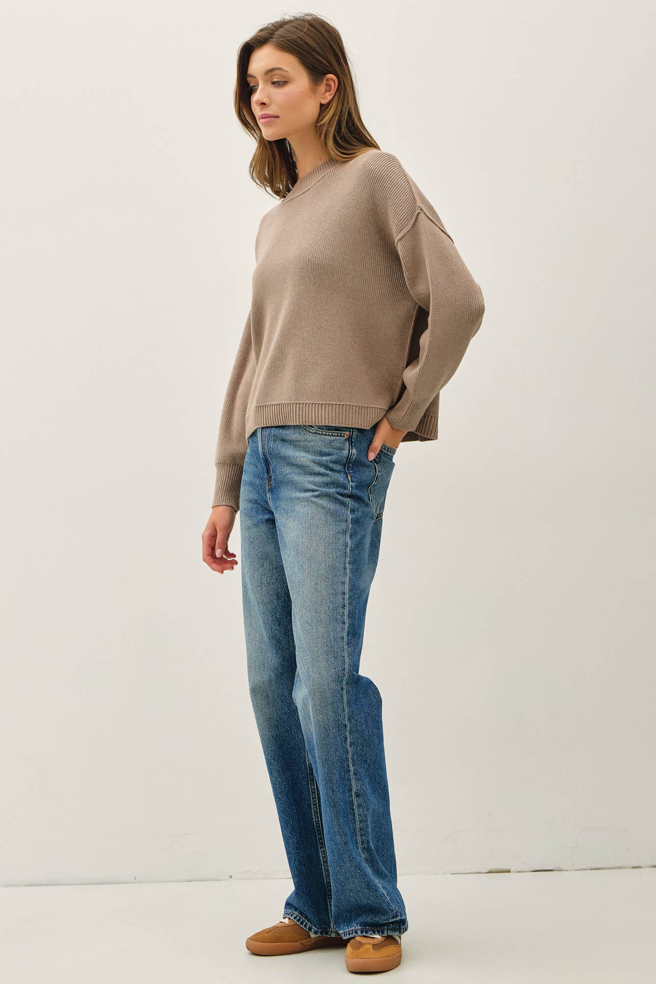 RIBBED KNIT SWEATER WITH RAW SEAM DETAILS