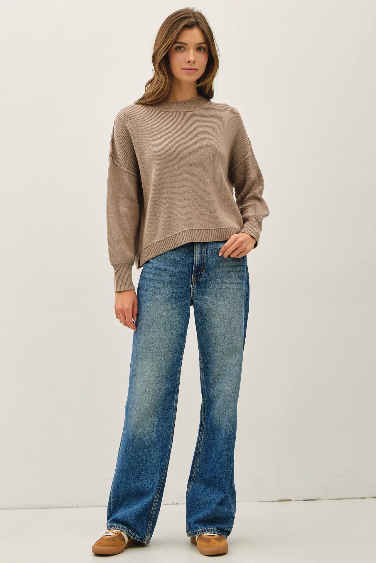 RIBBED KNIT SWEATER WITH RAW SEAM DETAILS